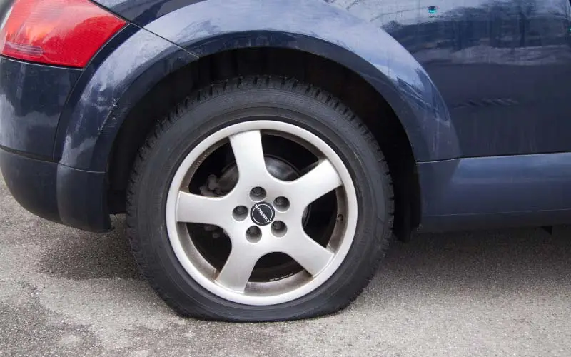 Car with a flat tire